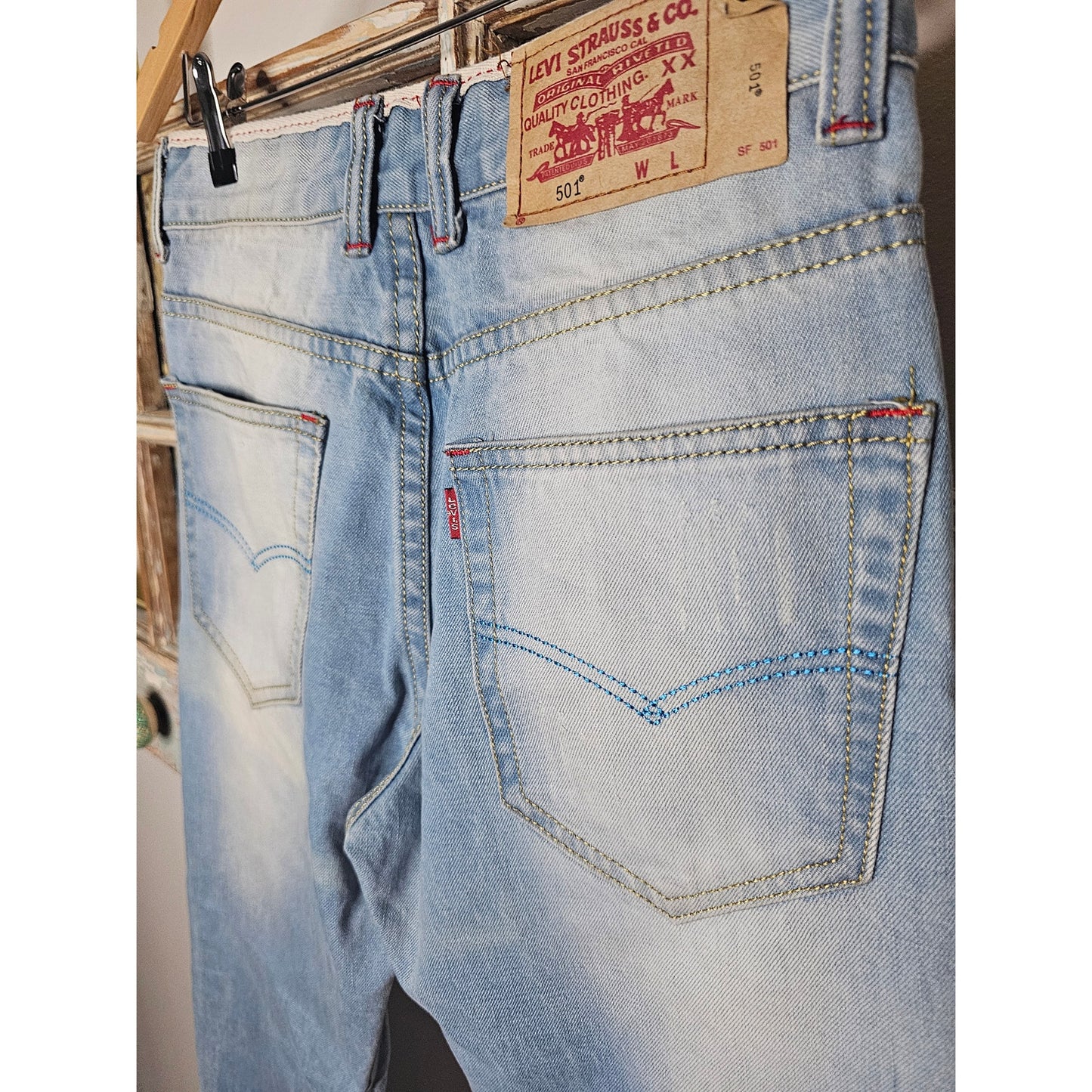 LEVIS 501 LIGHTER WASH TAPERED LEG LADIES SIZE 28