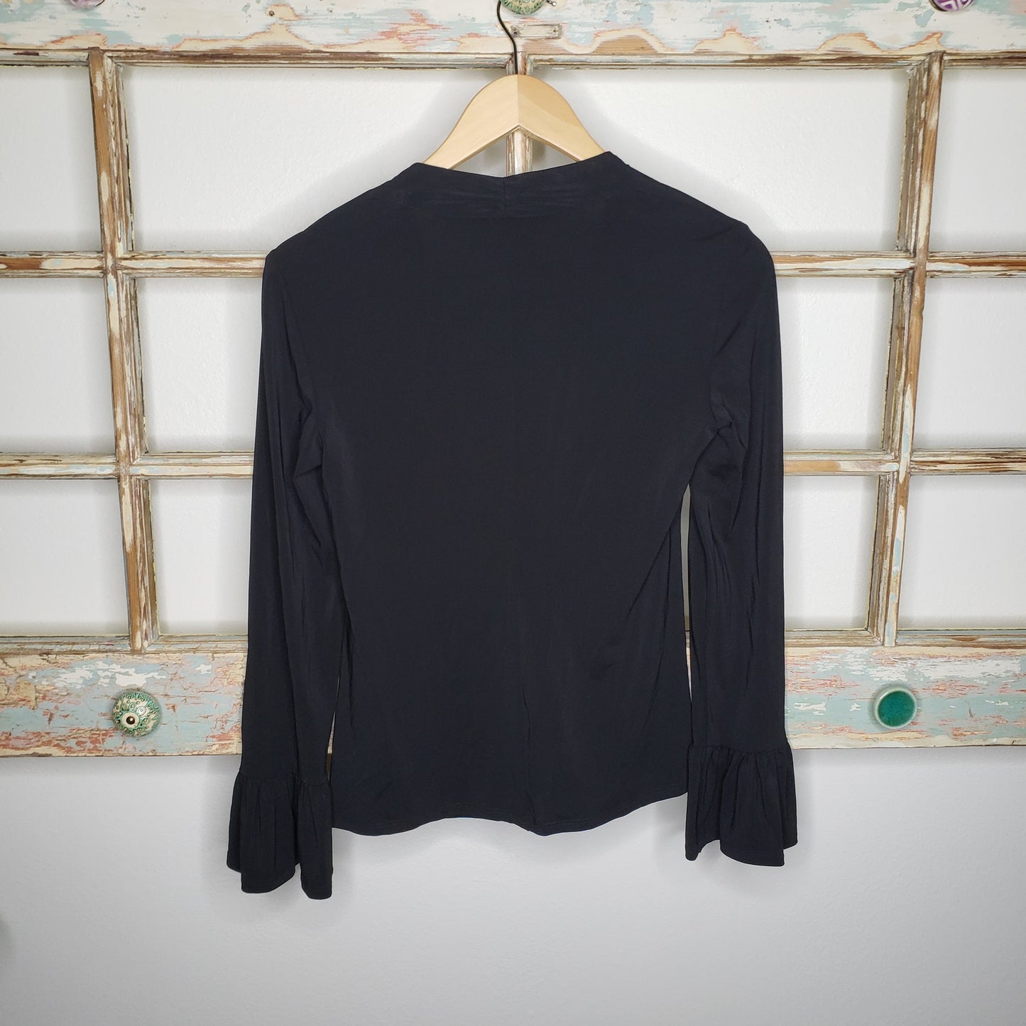 Trina Turk NWT blouse black with ruffled sleeves ladies size XS.