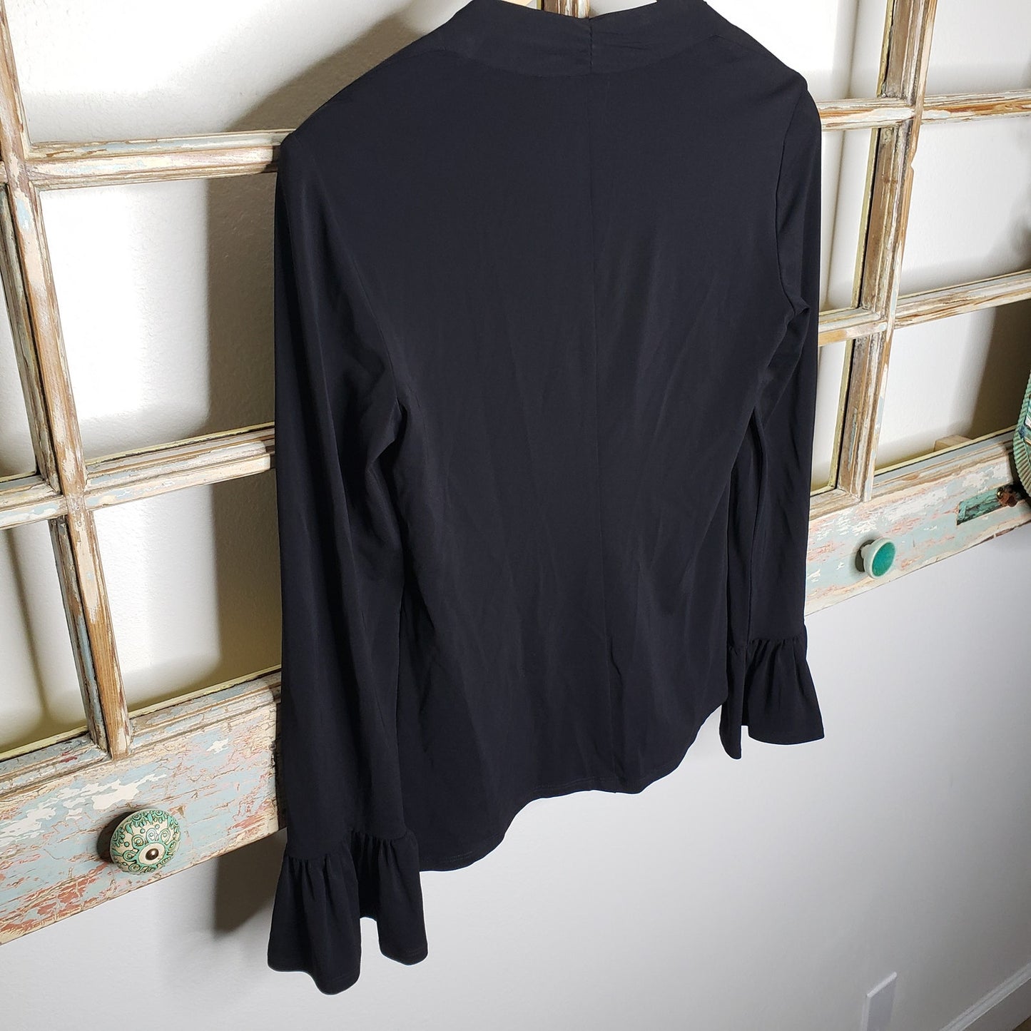 Trina Turk NWT blouse black with ruffled sleeves ladies size XS.
