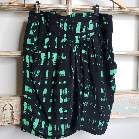 MYNE 100% silk mini skirt black/ green brush stroke design in ladies size 6
